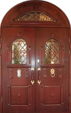 Стальная арочная дверь со стеклом и ковкой ДА-30 в дом из кирпича в Пскове