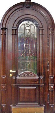 Арочная металлическая дверь массив со стеклом и ковкой ДА-50 в Пскове