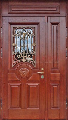 Филенчатая железная дверь со стеклом и ковкой ДСК-204 в Пскове