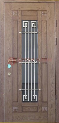 Стандартная железная дверь со стеклом темным и ковкой ДСК-5 в Пскове